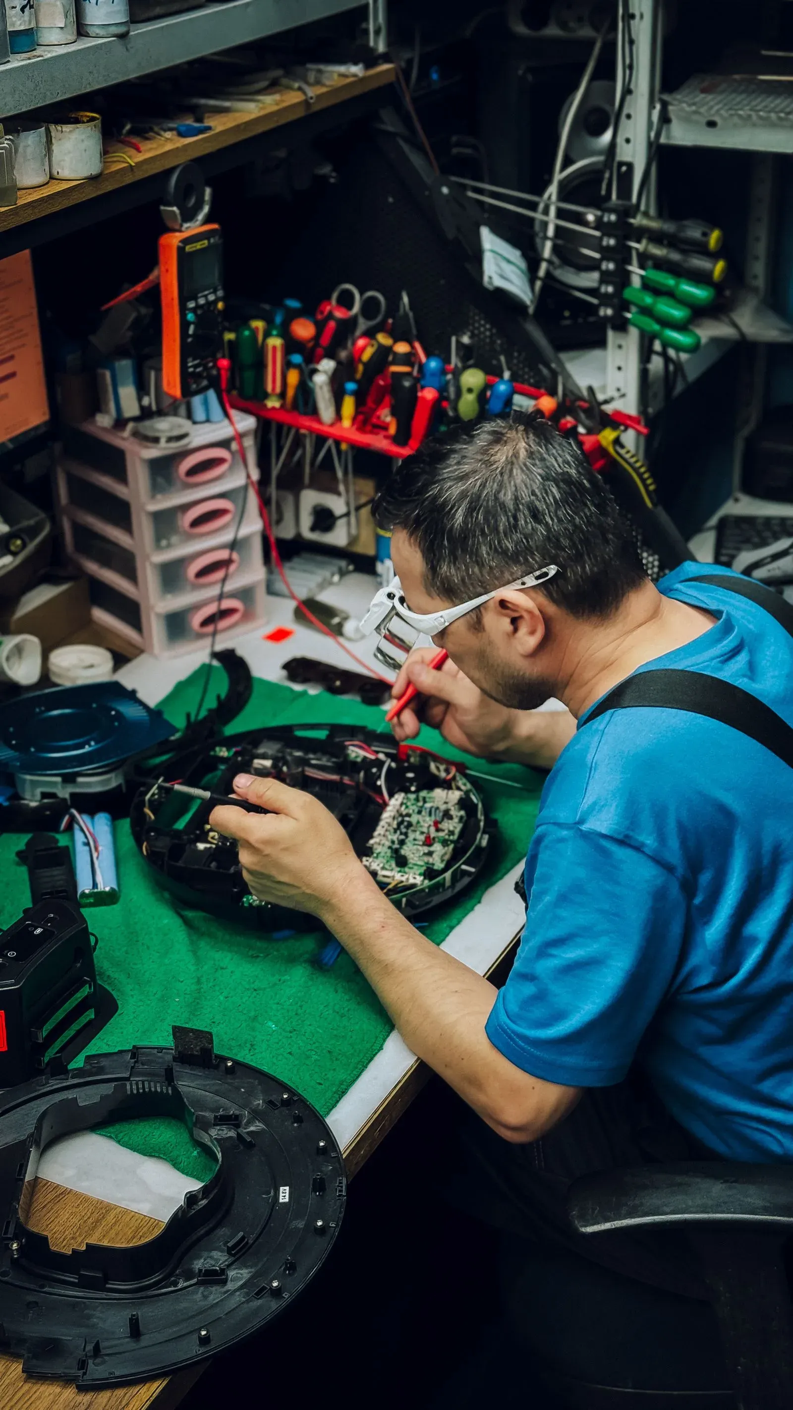 Hunar Care technician repairing a home appliance